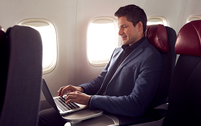 Man playing on his laptop